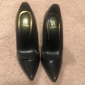 Heels with beautiful zipper/buckle detail on the back